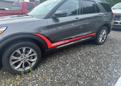 Green House Graphix installs custom Red Wing Shoes decals to Ford Explorer.